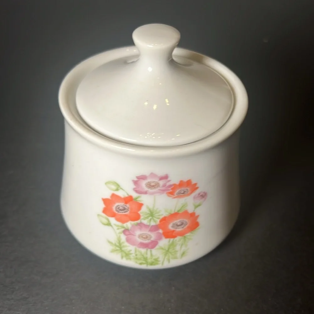Vintage white porcelain cream‎ and sugar with floral design